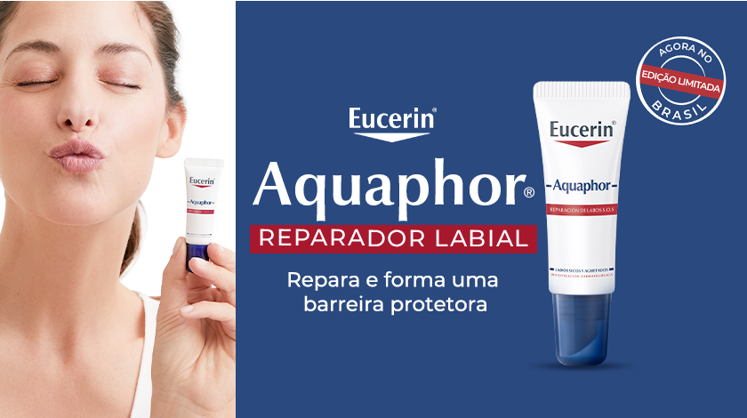 Fundo dividido ao meio: à esquerda, mulher de pele clara com os olhos fechados faz biquinho e segura o produto Eucerin Aquaphor próximo ao rosto. À direita, fundo azul escuro com o produto em destaque na parte inferior. O tubo é branco com detalhes em azul e vermelho. Acima, logo da Eucerin. Texto promocional centralizado. No canto superior direito, selo redondo com a frase 