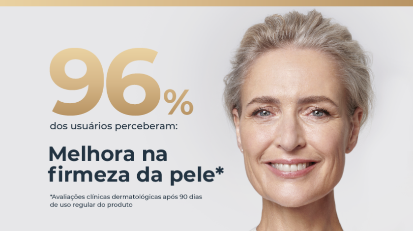 Mulher de pele clara e cabelos grisalhos curtos, sorrindo levemente de frente.