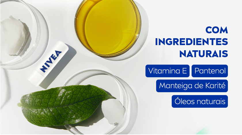 Imagem com fundo branco e itens dispostos em círculos de vidro. Há uma folha verde, um líquido amarelo, óleo, uma substância branca, creme, e um hidratante labial branco da marca NIVEA, posicionado horizontalmente com a tampa à esquerda.