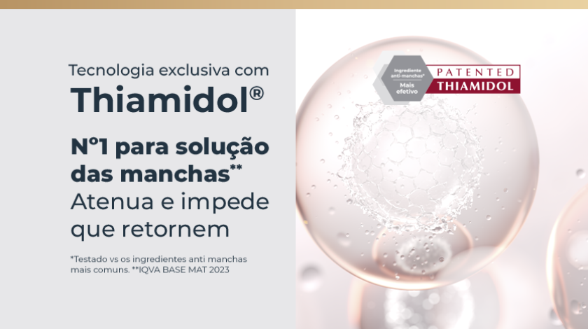 Esfera translúcida com textura de bolhas suspensa em fundo claro, transmitindo conceito tecnológico.