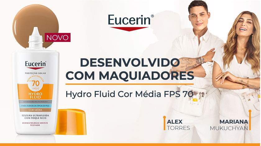 Frasco do Eucerin Hydro Fluid Cor Média FPS 70 está ao lado esquerdo, ao lado direito estão dois maquiadores sorrindo em pé. O fundo é claro, com detalhes em laranja.