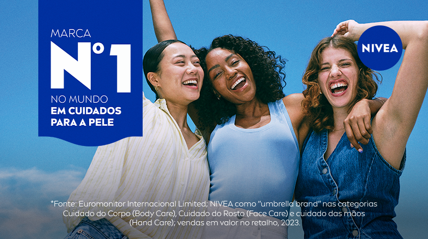 Imagem com três mulheres sorrindo, cada uma de uma etnia diferente. O fundo é um céu azul. Ao lado esquerdo, o selo de marca nº1 aparece.