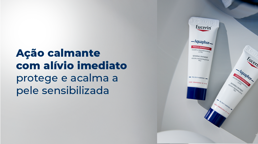 A imagem possui fundo cinza. Ao lado direito, duas embalagens de Aquaphor aparecem em destaque.