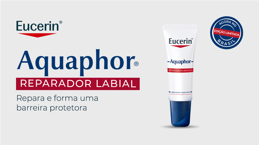 Fundo neutro. Ao lado direito, a embalagem branca e azul de Aquaphor labial se destaca com um selo de edição limitada. Ao lado esquerdo, o logo de Eucerin aparece no canto superior, seguido do texto informativo.