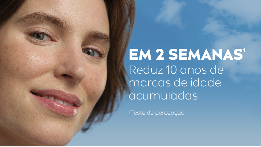 Imagem com fundo azul de céu. Ao lado esquerdo, uma mulher sorri.