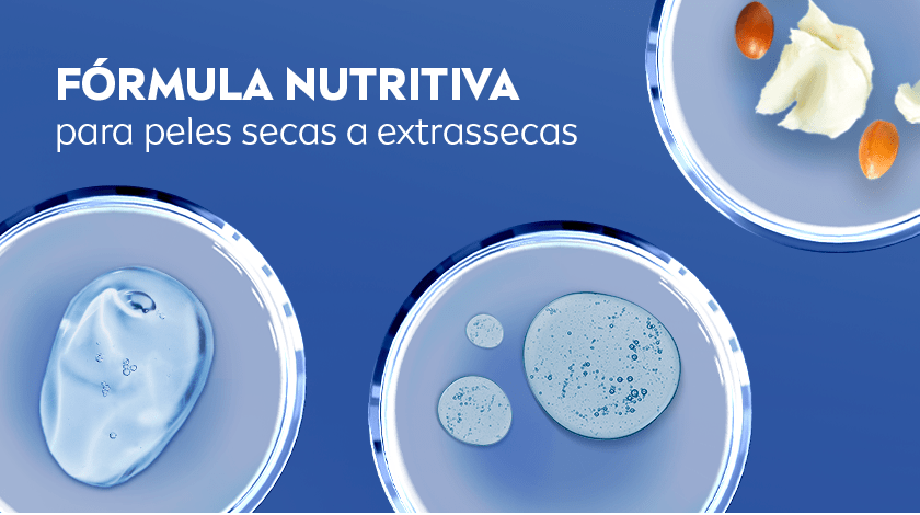 A imagem apresenta representações dos ingredientes que estão presentes na fórmula como manteiga de karité e ácido hialurônico em um fundo azul. Fórmula nutritiva para peles secas a extrassecas