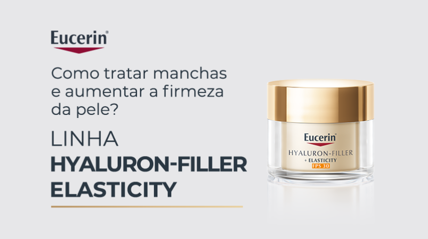 Pote de creme facial Eucerin com tampa dourada, em fundo cinza claro.