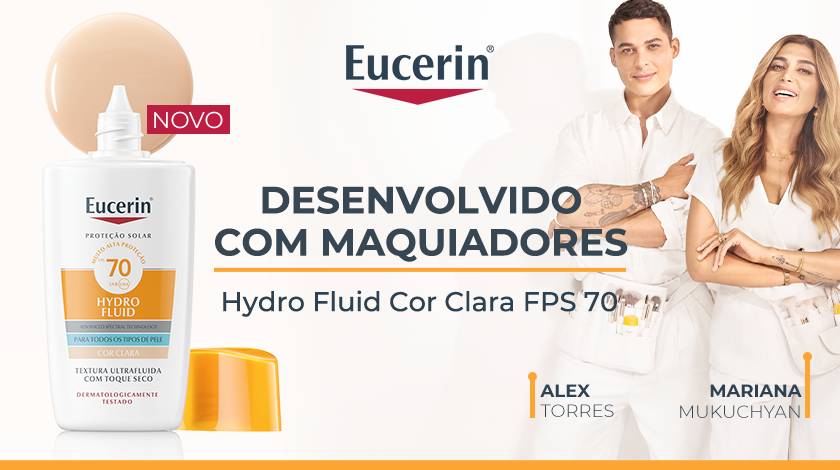 Frasco do Eucerin Hydro Fluid Cor Clara FPS 70 está ao lado esquerdo, ao lado direito estão dois maquiadores sorrindo em pé. O fundo é claro, com detalhes em laranja.