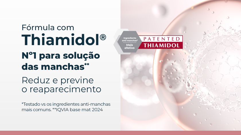 Ilustração científica de esferas translúcidas rosadas representando moléculas. Uma delas está ampliada, com detalhe em relevo que remete à tecnologia exclusiva do ingrediente ativo.