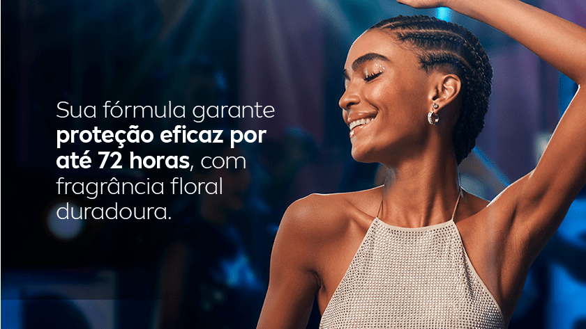 Mulher negra sorridente, com cabelo trançado, levanta o braço em pose confiante. Fundo escuro desfocado com iluminação suave. Texto sobreposto em branco.