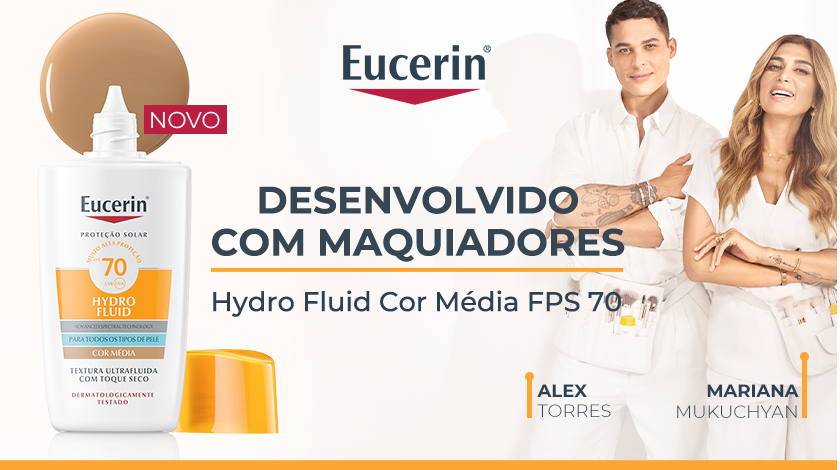 Frasco do Eucerin Hydro Fluid Cor Média FPS 70 está ao lado esquerdo, ao lado direito estão dois maquiadores sorrindo em pé. O fundo é claro, com detalhes em laranja.