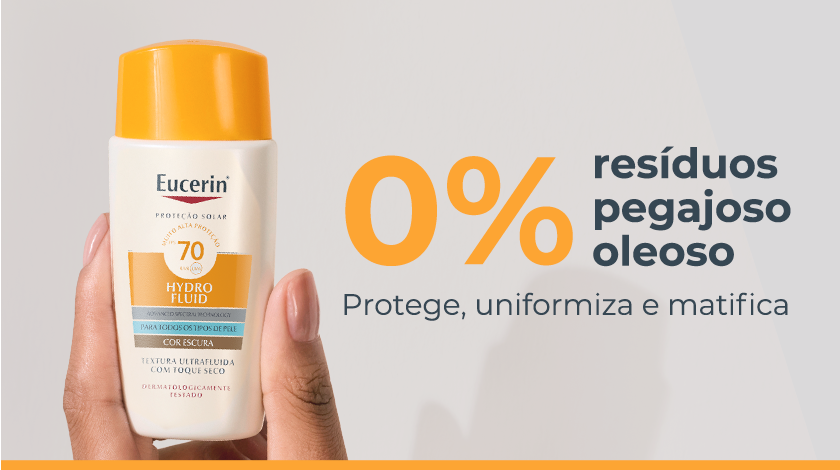 Imagem em close do frasco Eucerin Hydro Fluid FPS 70 em fundo claro.