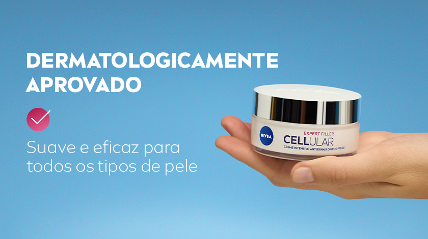 Mão segurando o creme com destaque para a aprovação dermatológica para todos os tipos de pele.