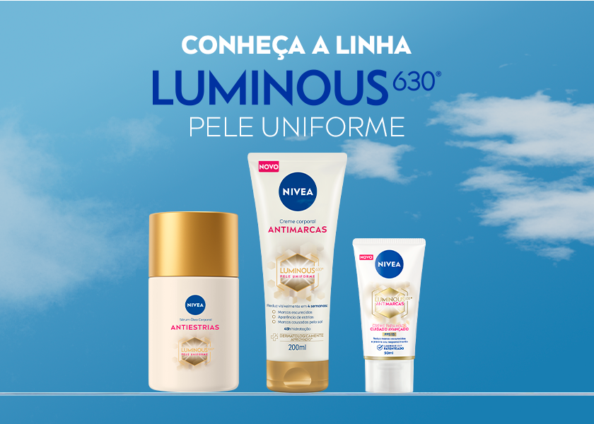 Fundo azul com nuvens brancas. Ao centro, três produtos da linha NIVEA Luminous630°: creme, sérum e creme para mãos.